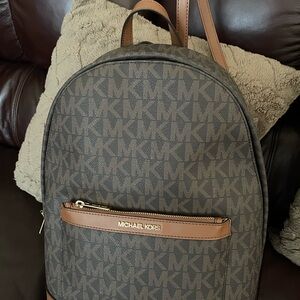 Michael Kors Monogram Brown Backpack